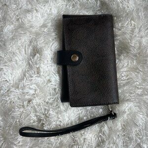 Coach brown and black wristlet with card holder on inside flap